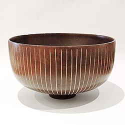 Wooden Vertical Carved Bowl - Handcrafted decorative bowl with intricate vertical designs, showcasing the beauty of natural wood.