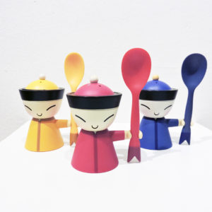 Alessi Mr Chin Egg Cup - Colorful and playful egg cup in red, blue, and yellow, designed by Stefano Giovannoni.