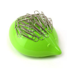 Alessi Dozi Porcupine Paperclip Holder - a green or fuchsia porcupine-shaped desk accessory made of thermoplastic resin.
