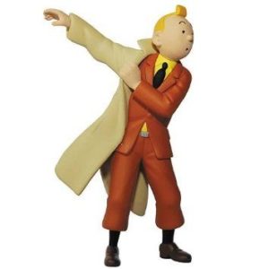 Tintin collectible figurine featuring Tintin in red suit and trench coat, crafted with high-quality painted polyresin material.