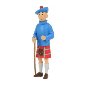 Collectible figurine of Tintin from "The Black Island" wearing a kilt, made of hand-painted polyresin, standing at 8.5cm tall.